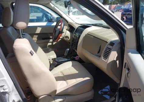 2009 Ford Escape Limited z USA, uszkodzony, nr VIN 1FMCU94G19KB10386